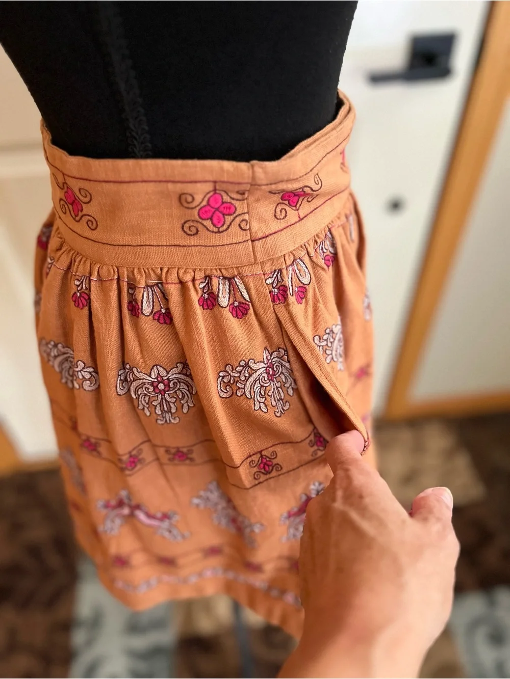Anthropologie Meghan terracotta embroidered folkloric mini wrap skirt. Size 0